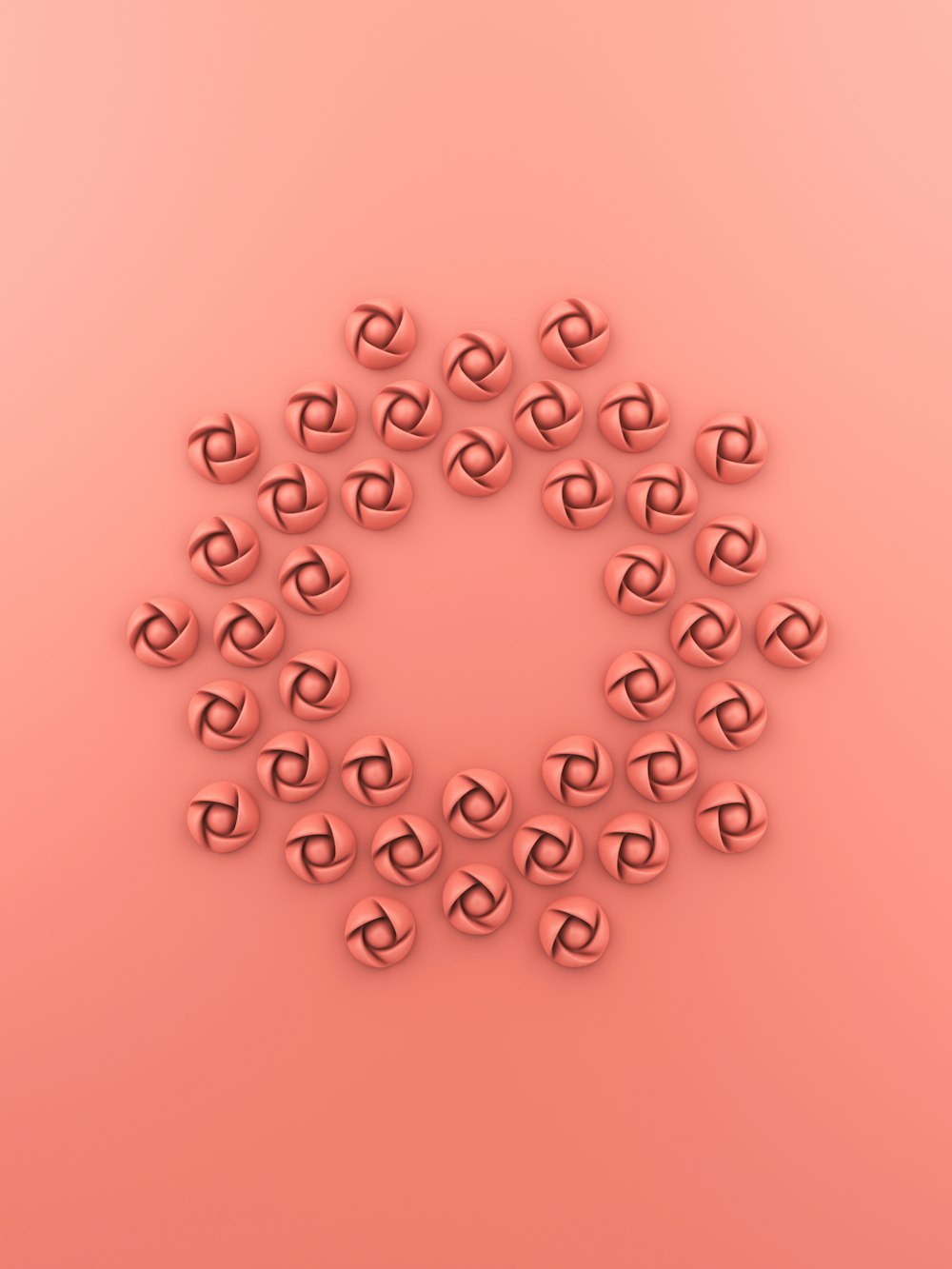 white round plastic beads on pink surface