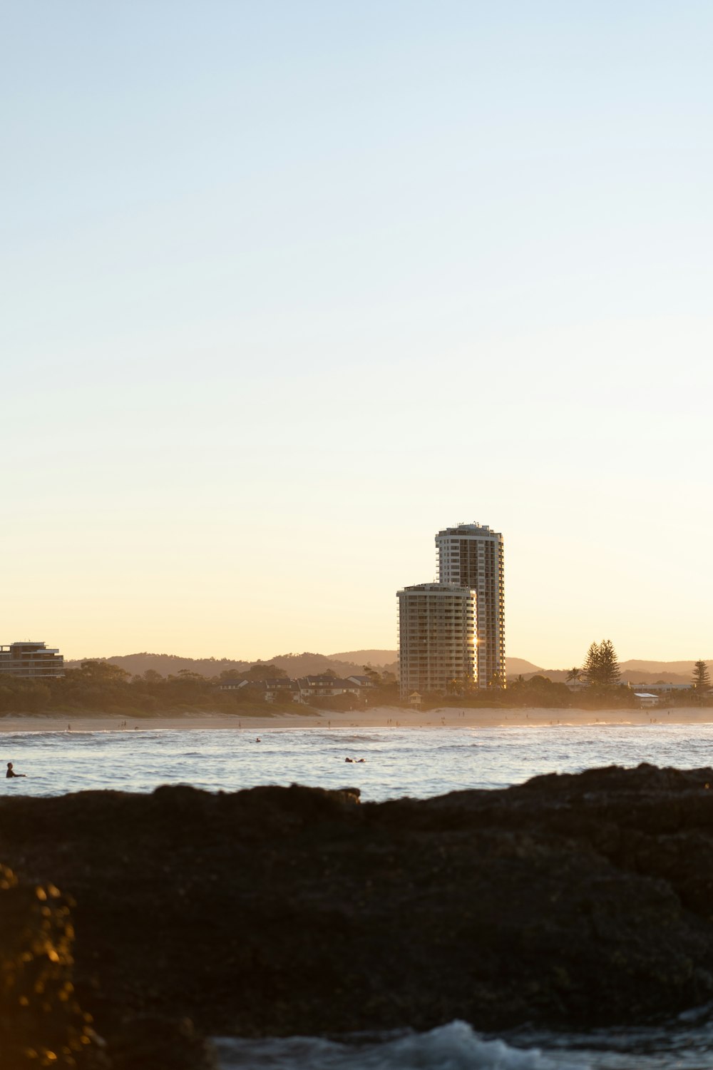 city skyline across the sea during daytime