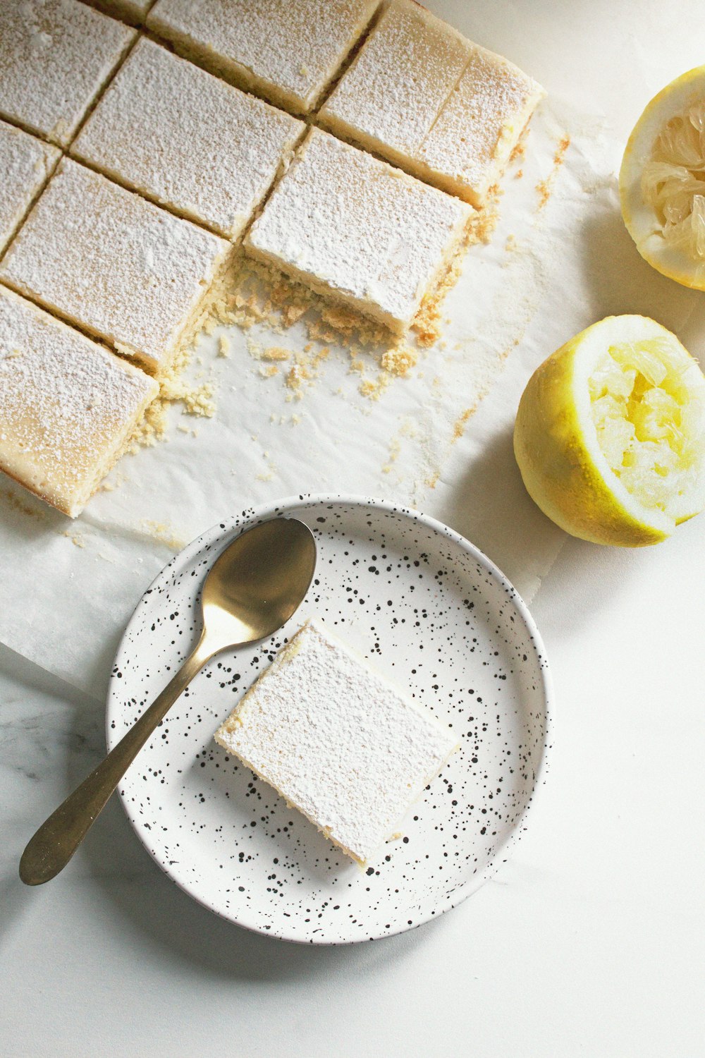 sliced lemon on white ceramic plate