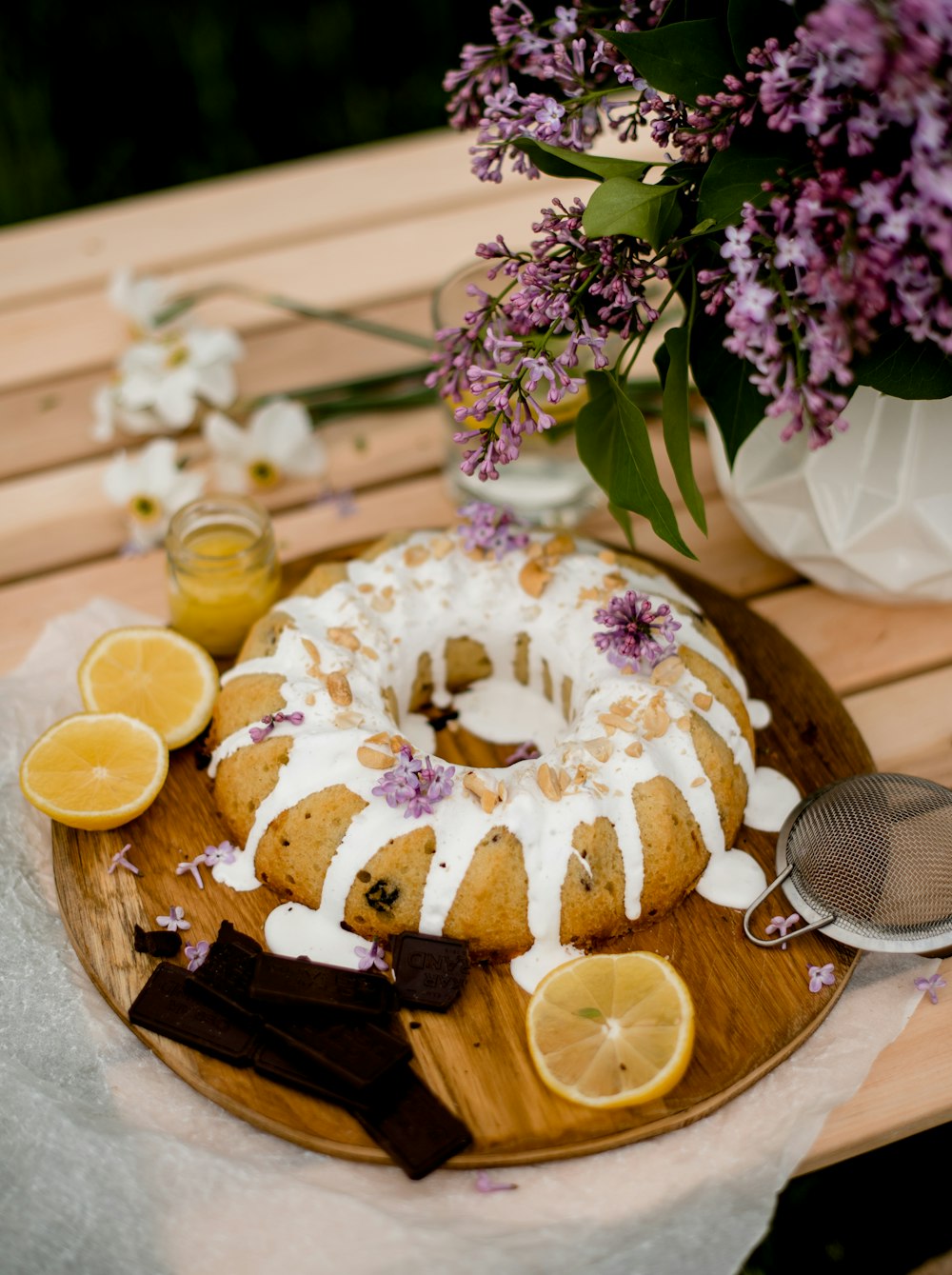 brown and white doughnut on brown wooden tray