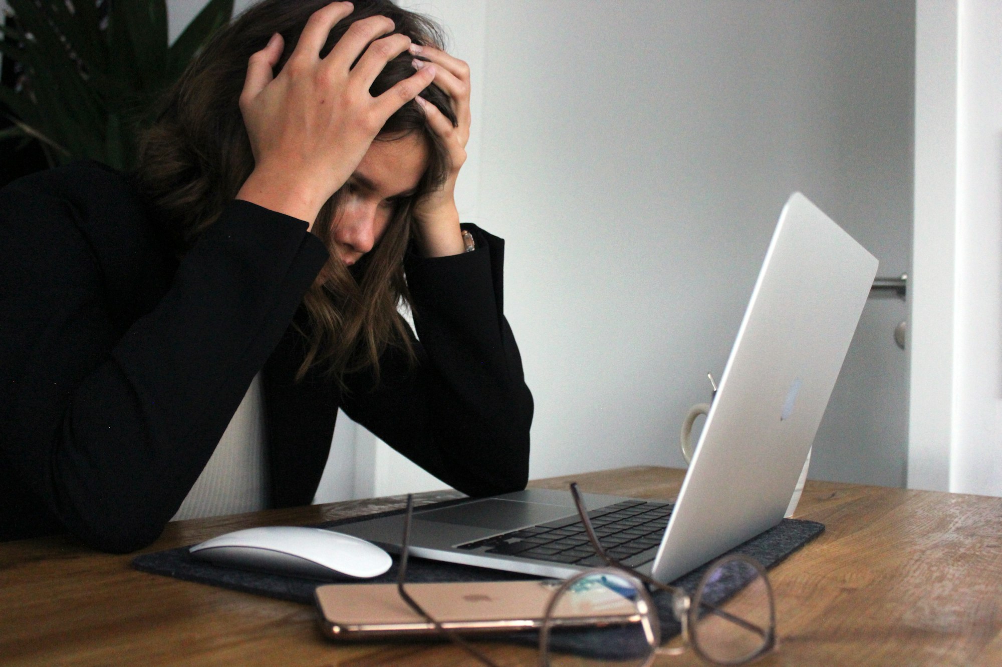 a business woman who is stressed and frustrated