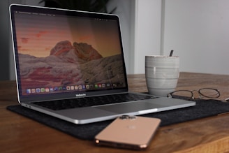 A sleek laptop on a modern desk setup.