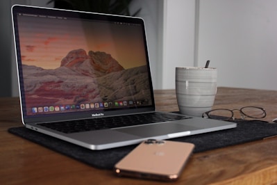 A sleek laptop on a modern desk setup.