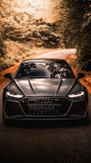 black audi a 4 on road during daytime