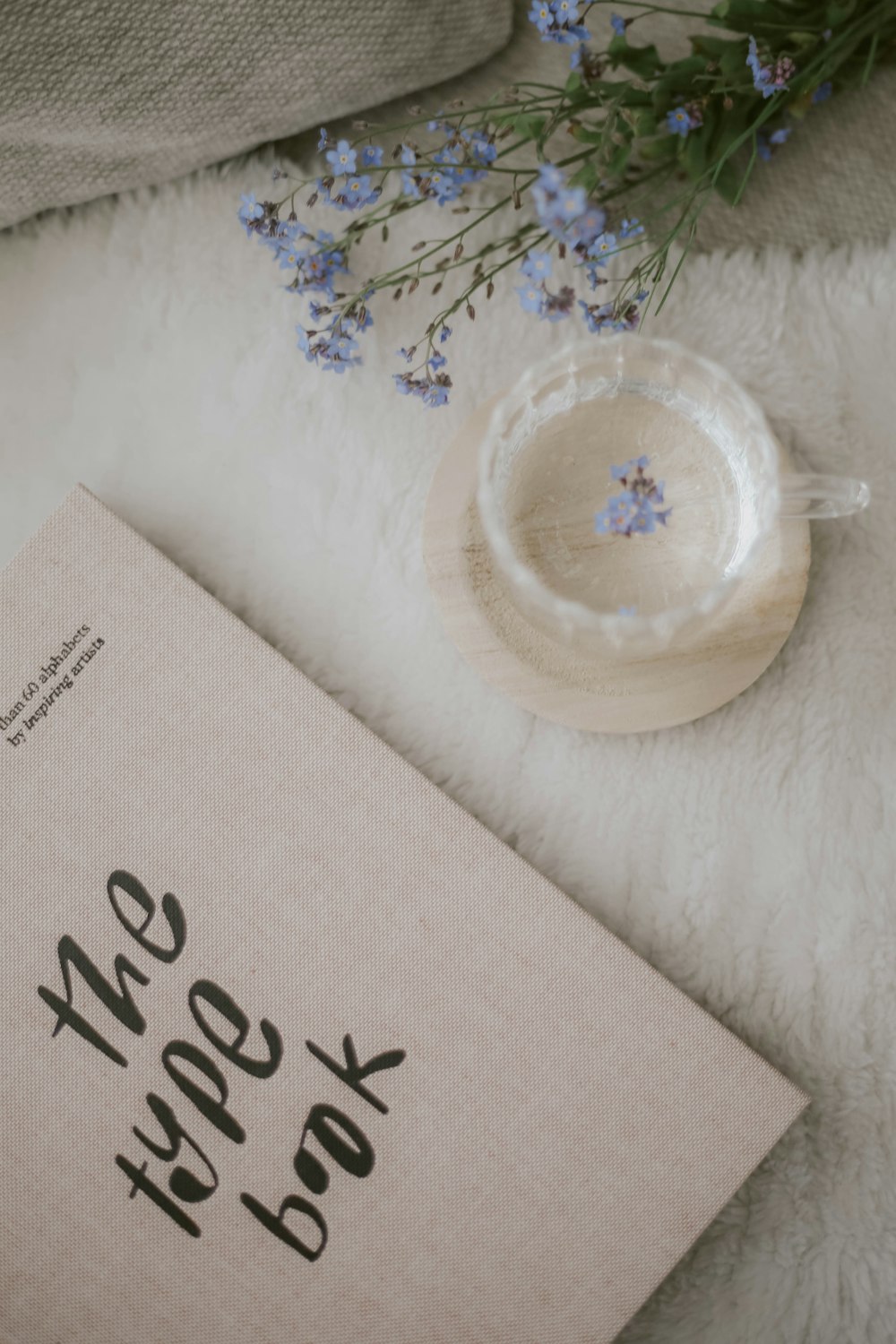 white box on white floral textile