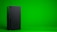 A black, rectangular gaming console stands upright against a vibrant green background. The console has a simple, sleek design with minimalistic features including a disc slot and a few buttons.