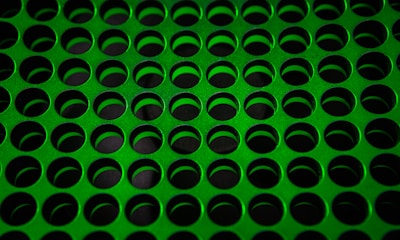 Image showing perforated galvanized cable trays with visible holes for ventilation.