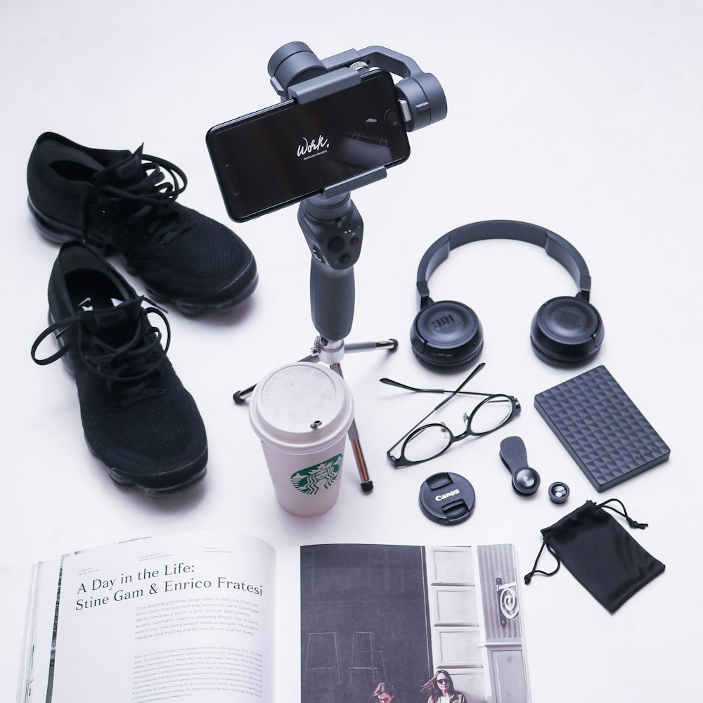 black dslr camera on white table