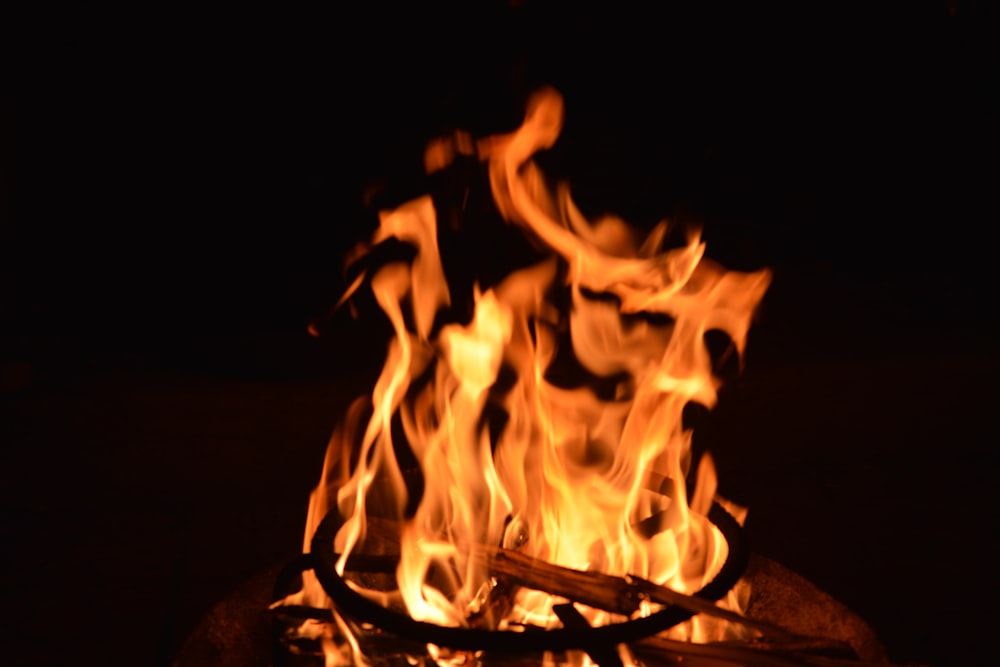 fire in black metal fire pit