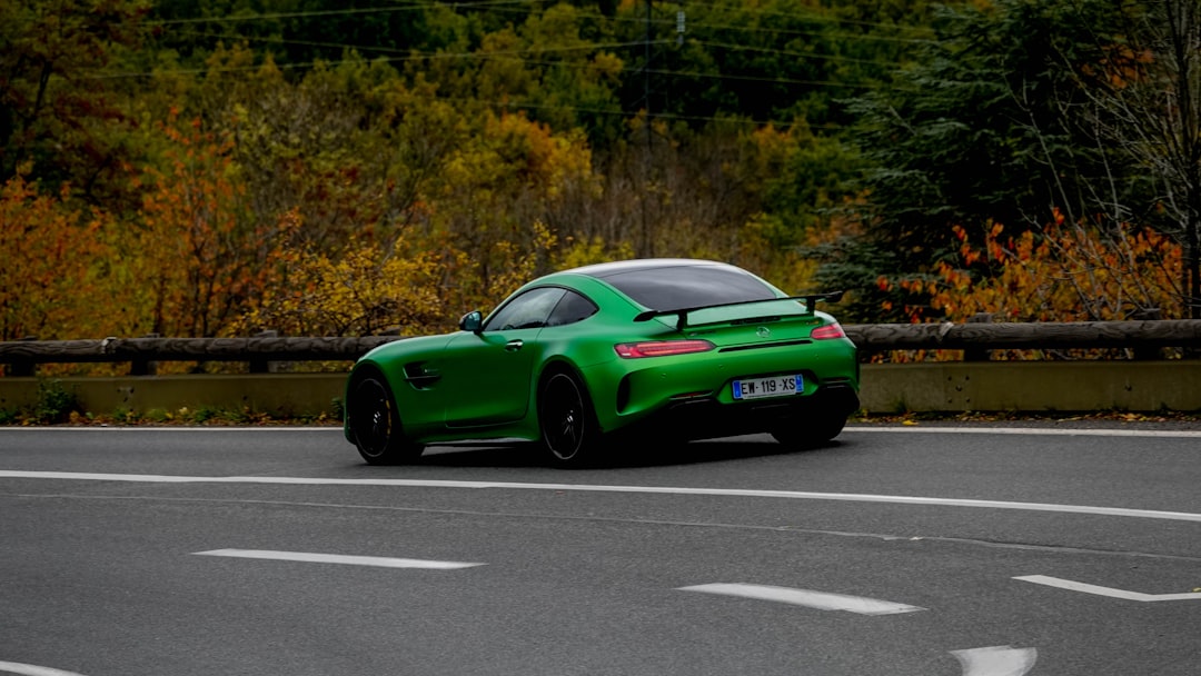 green porsche 911 on road during daytime