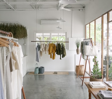 clothes hanged on clothes rack