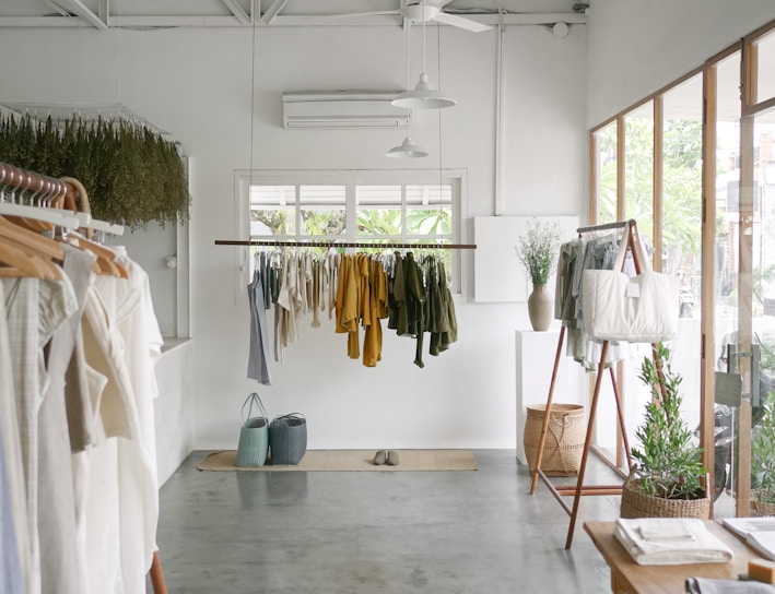 clothes hanged on clothes rack