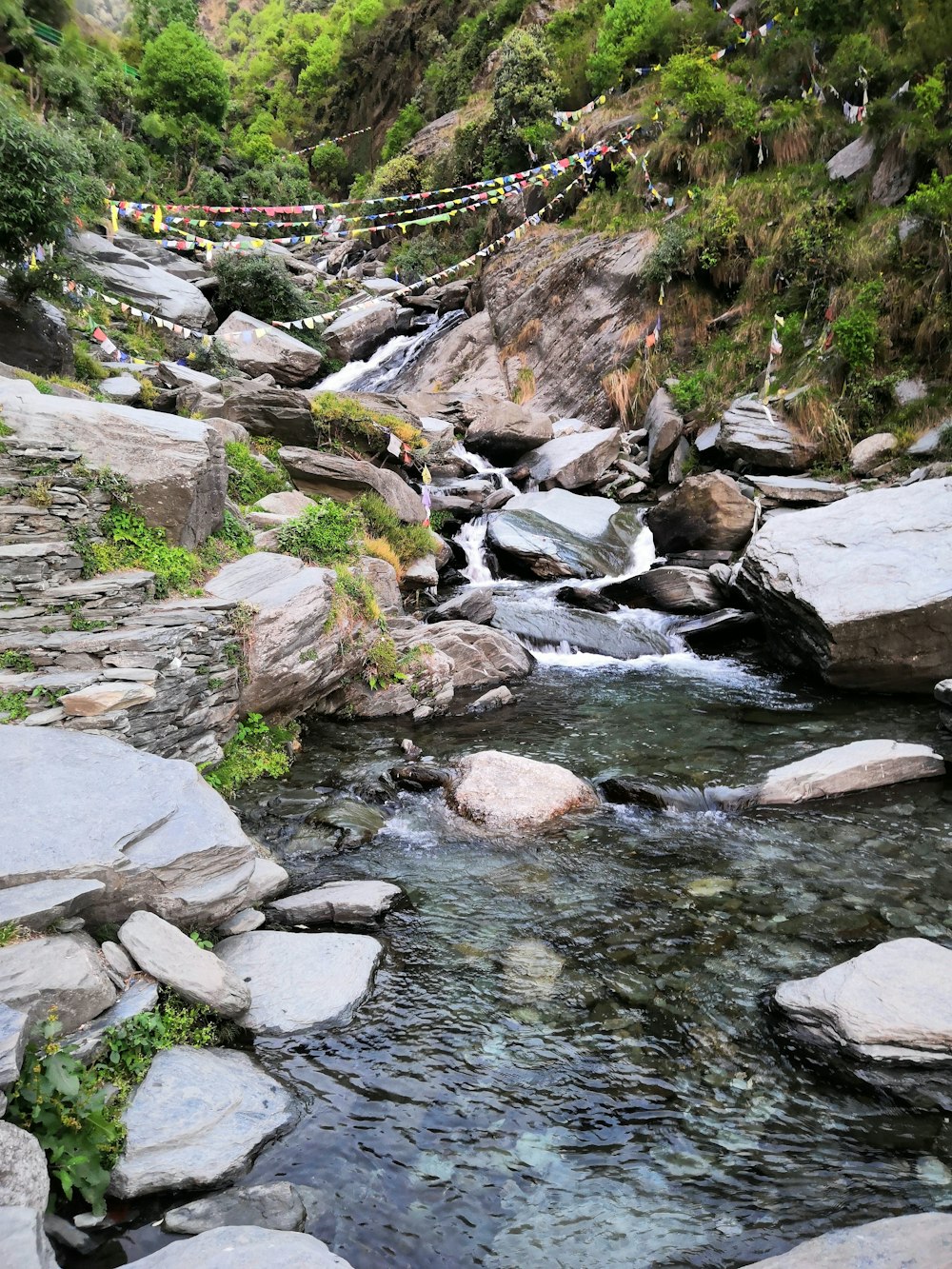 gray rocks on river during daytime