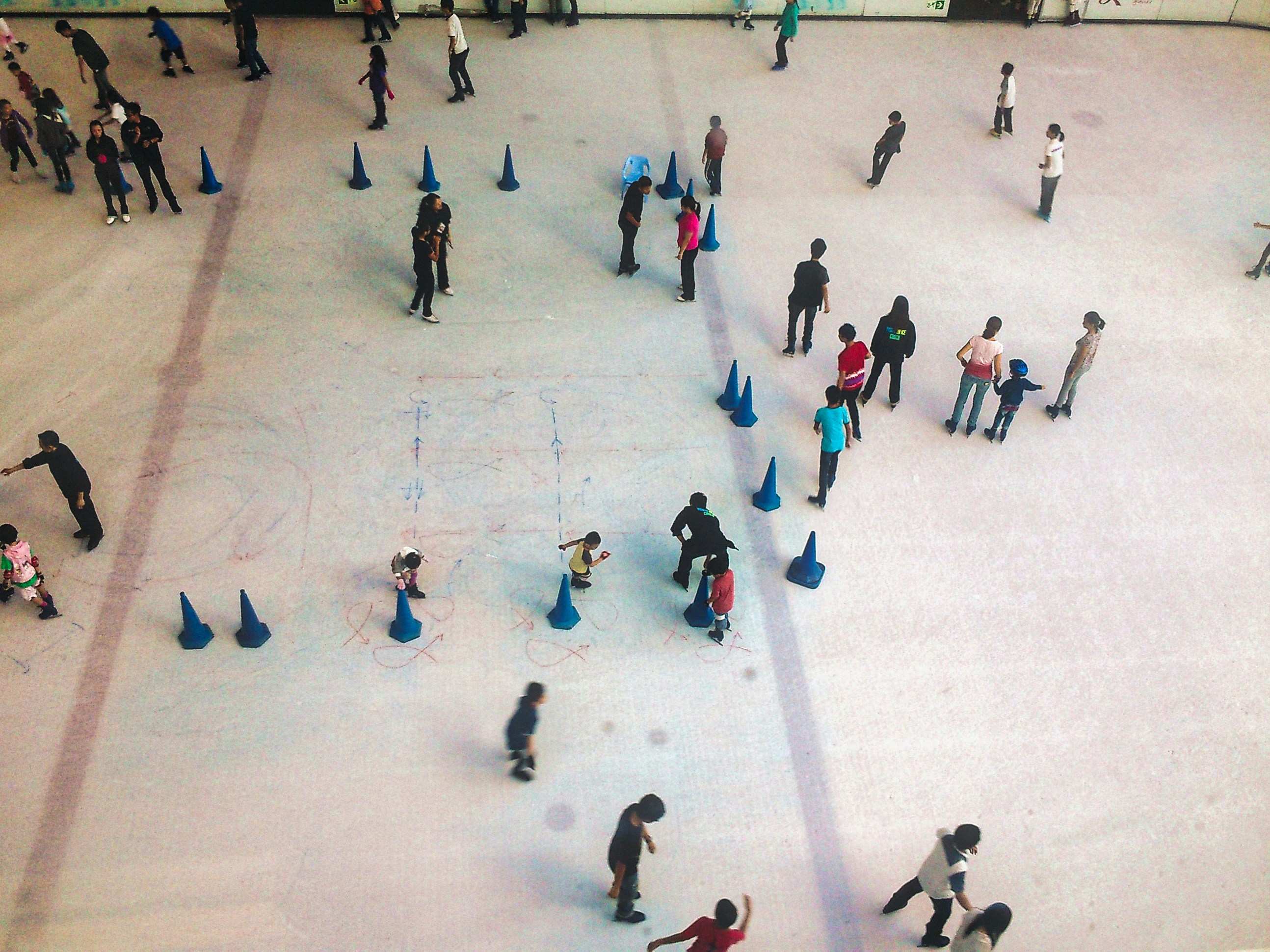 people walking on ice field