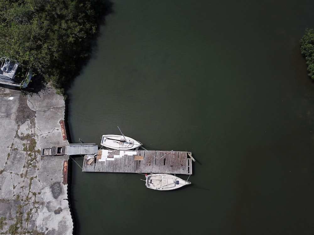 white boat on river during daytime