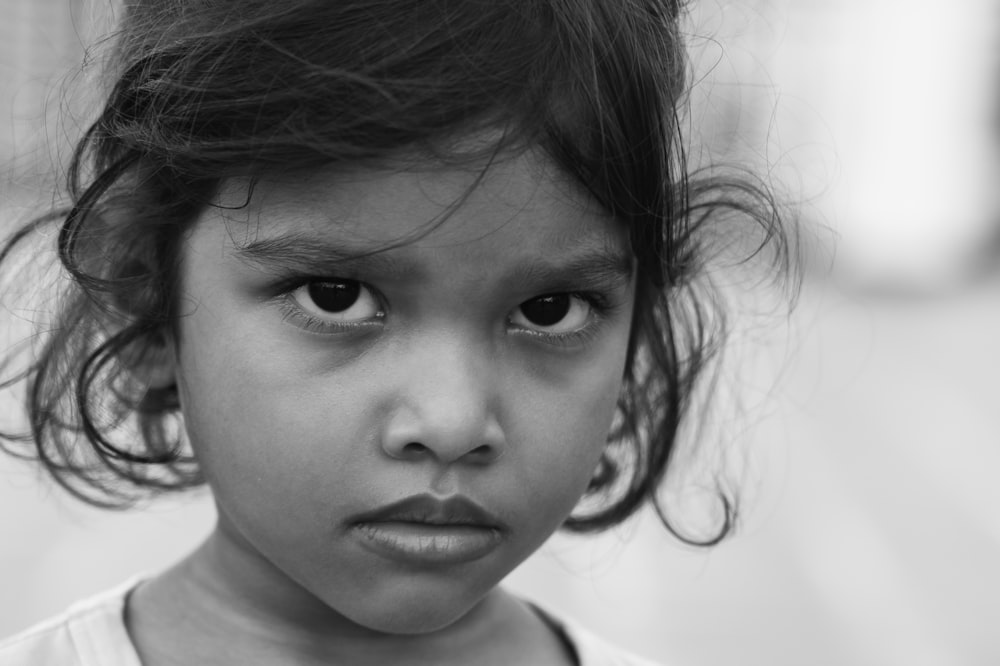 grayscale photo of girl in crew neck shirt