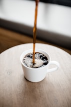 white ceramic mug with coffee