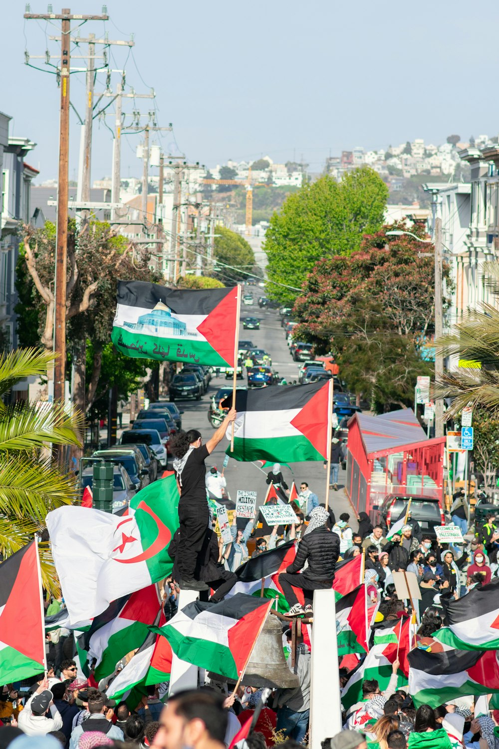 people gathering on street during daytime