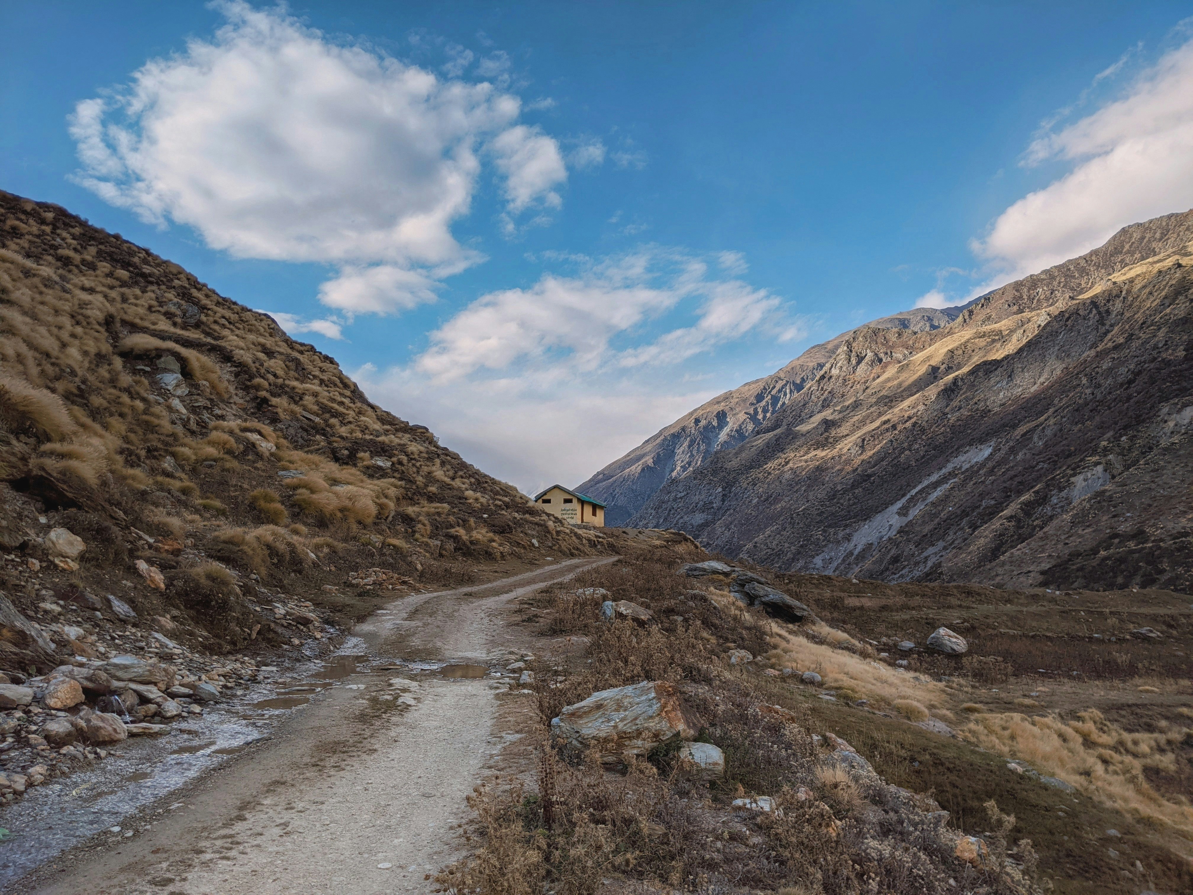 brown and green mountains under blue sky during daytime