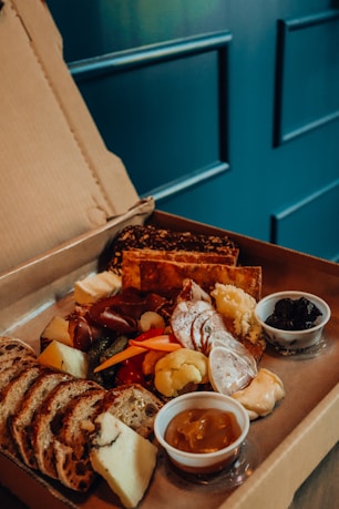 brown and white food on brown box
