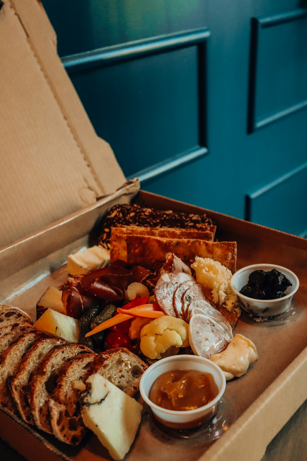 brown and white food on brown box