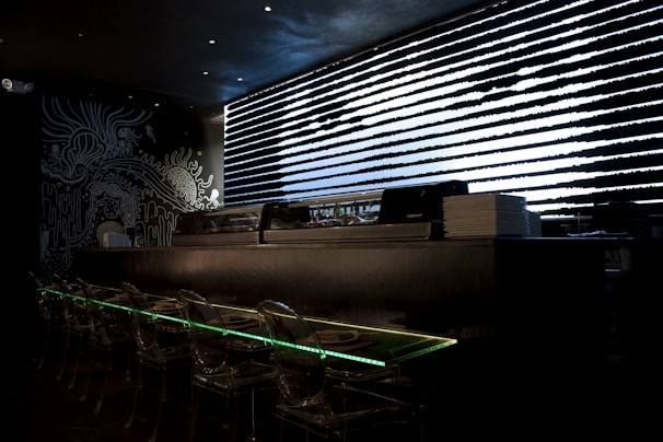 Warm, inviting interior of Sushi Otimo with subtle 3D lighting effects and smooth shadows enhancing the minimalist decor.