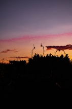 Sunset view over Geylang Serai with community members gathering for a festive event.