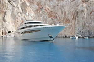 white and blue cruise ship on blue sea during daytime