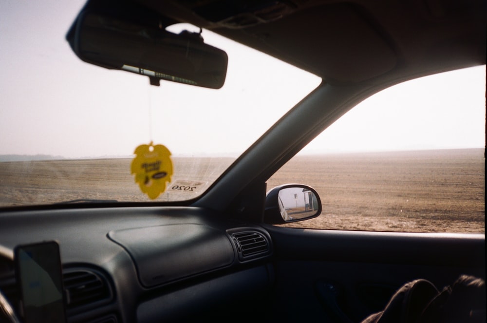 yellow car on road during daytime