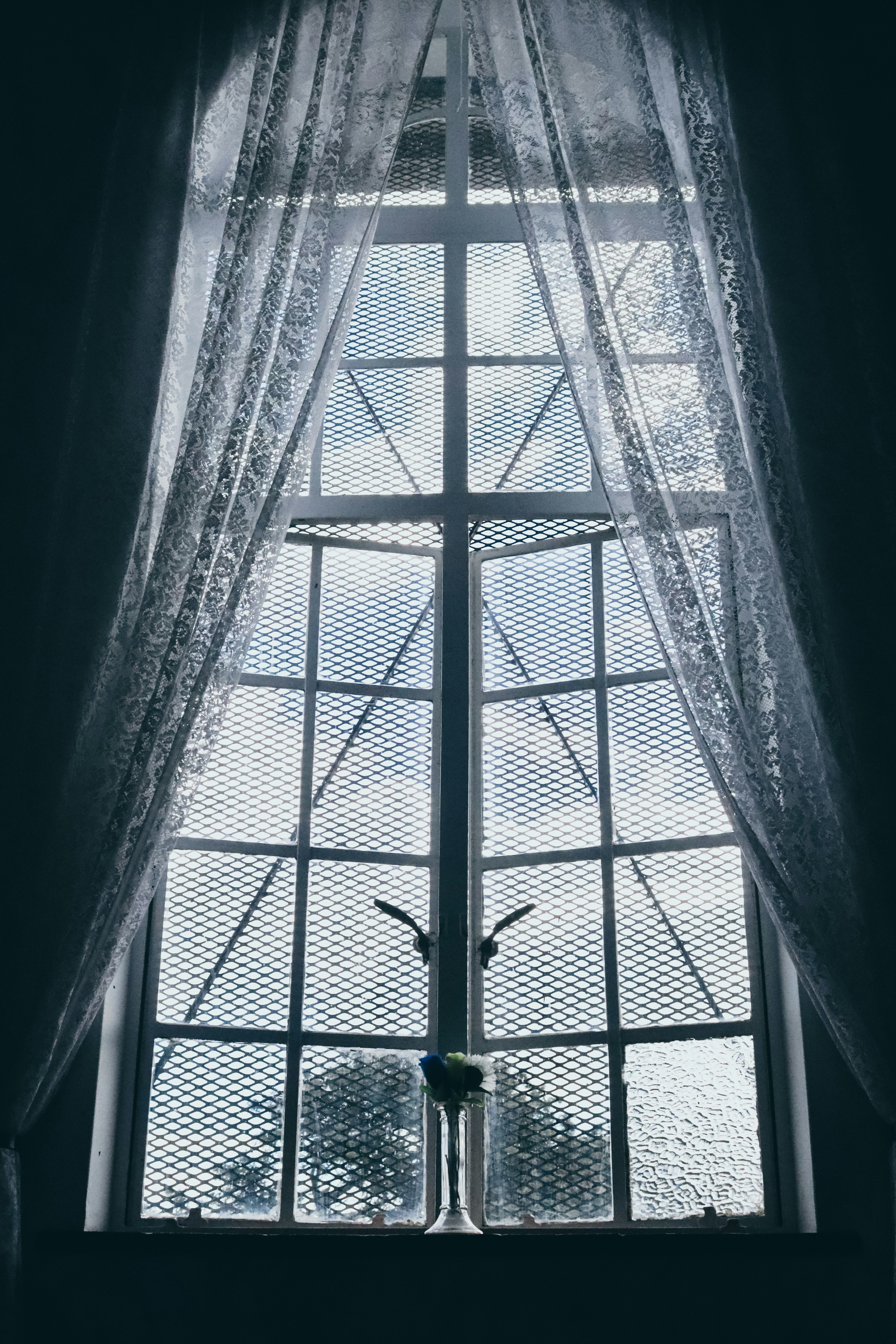 white wooden framed glass window