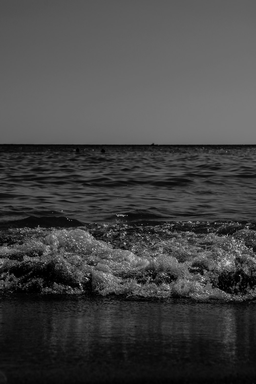 grayscale photo of ocean waves