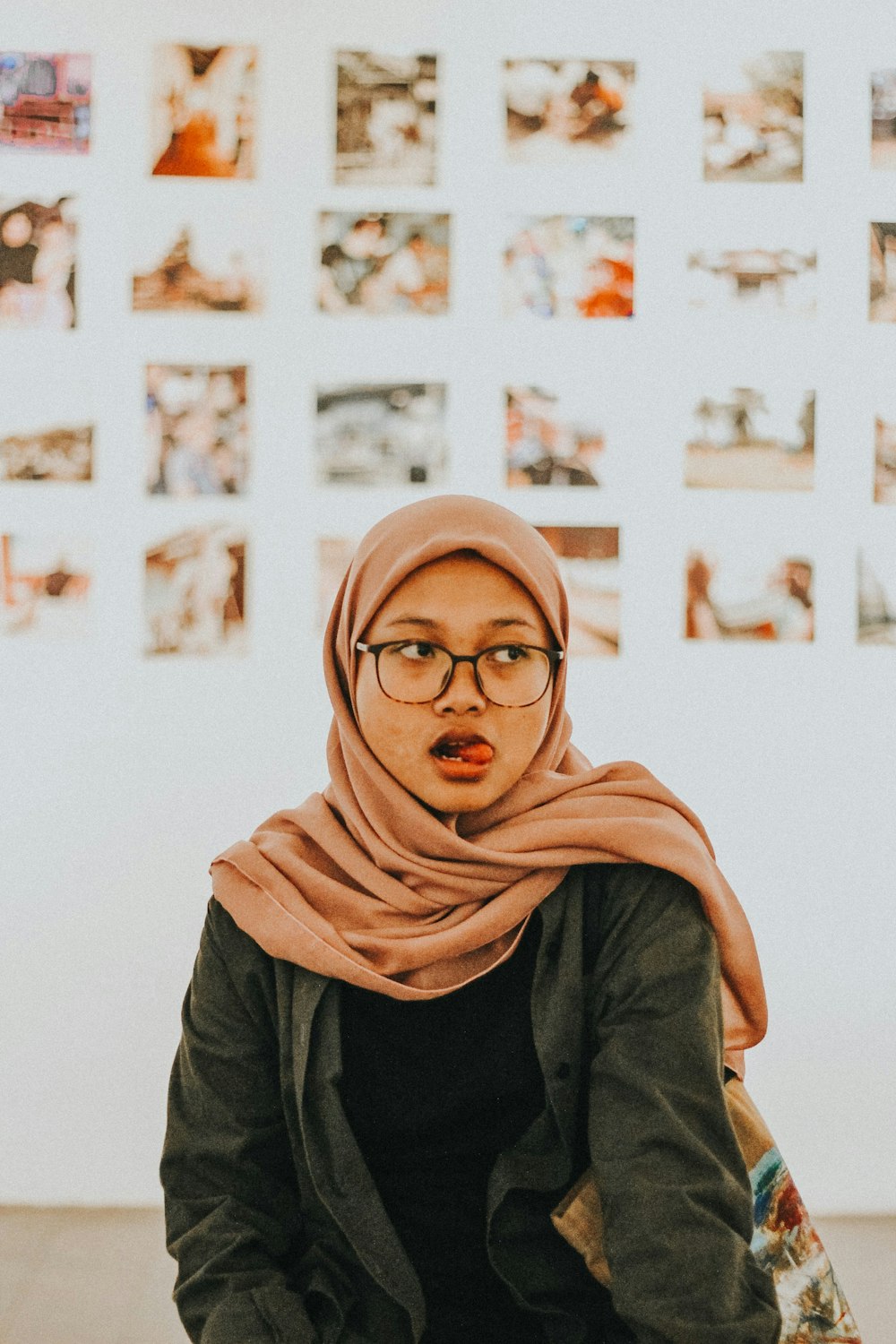 woman in brown hijab and green long sleeve shirt