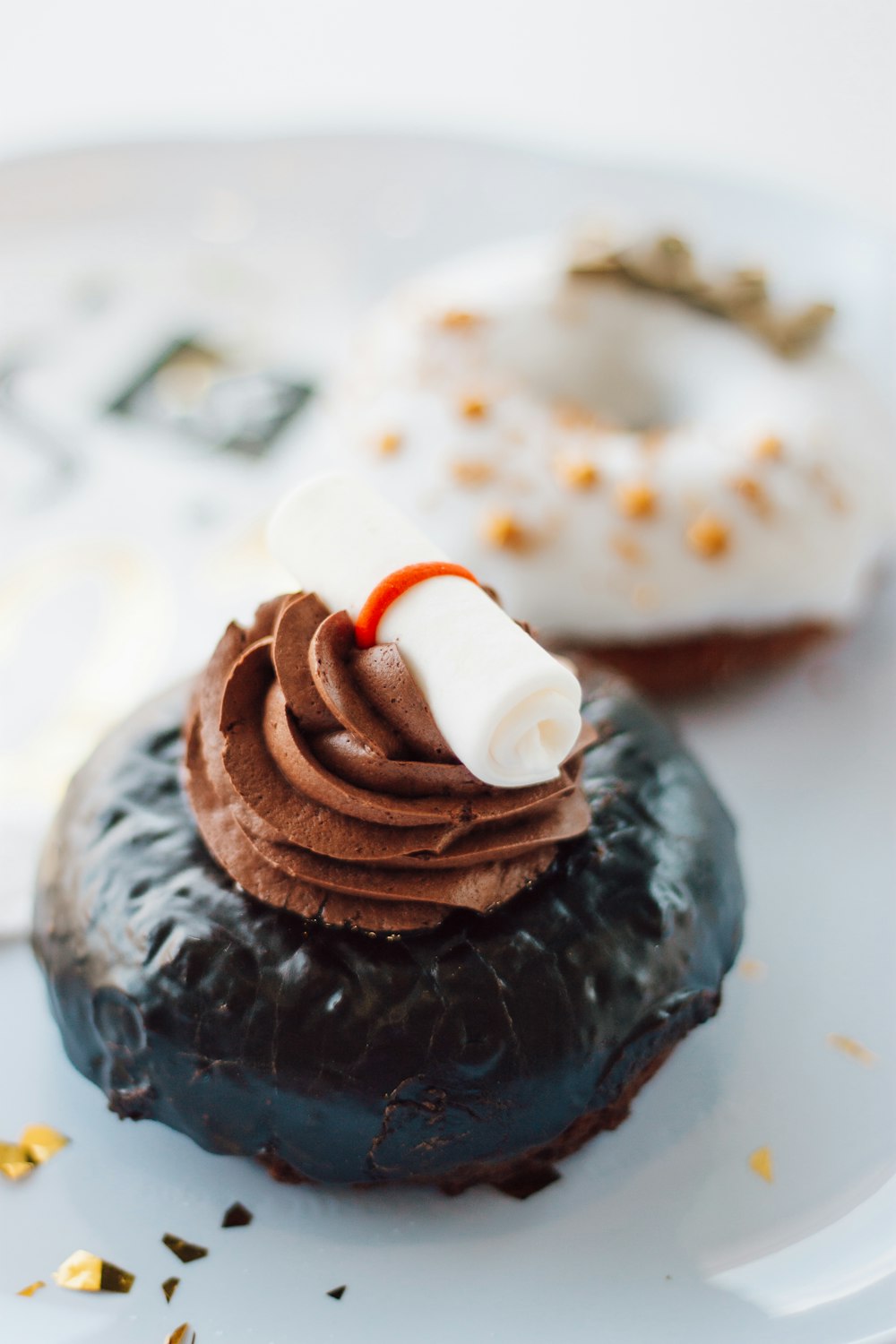 chocolate cake with white cream on top