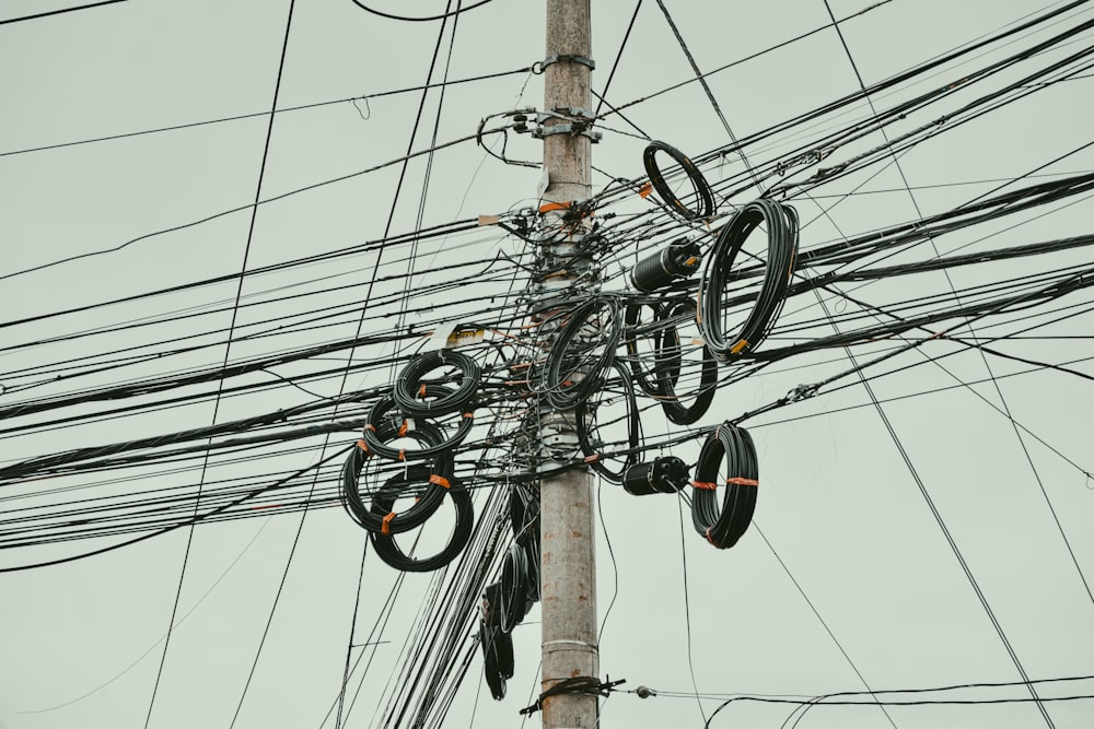 black and gray electric wires on electric post