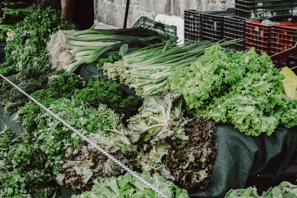 green vegetable on black plastic basket