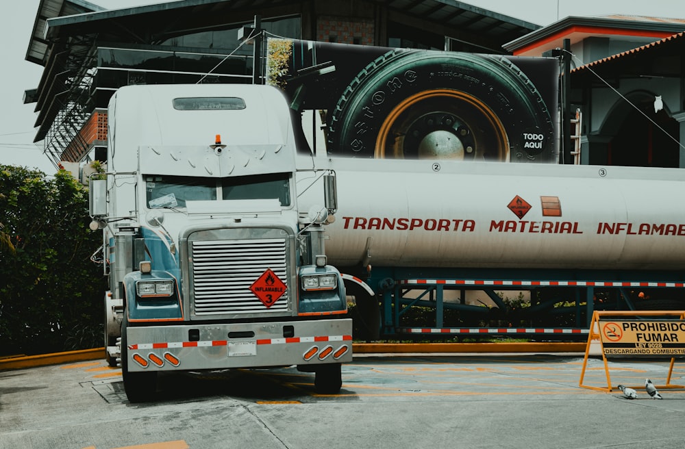 white and red freight truck