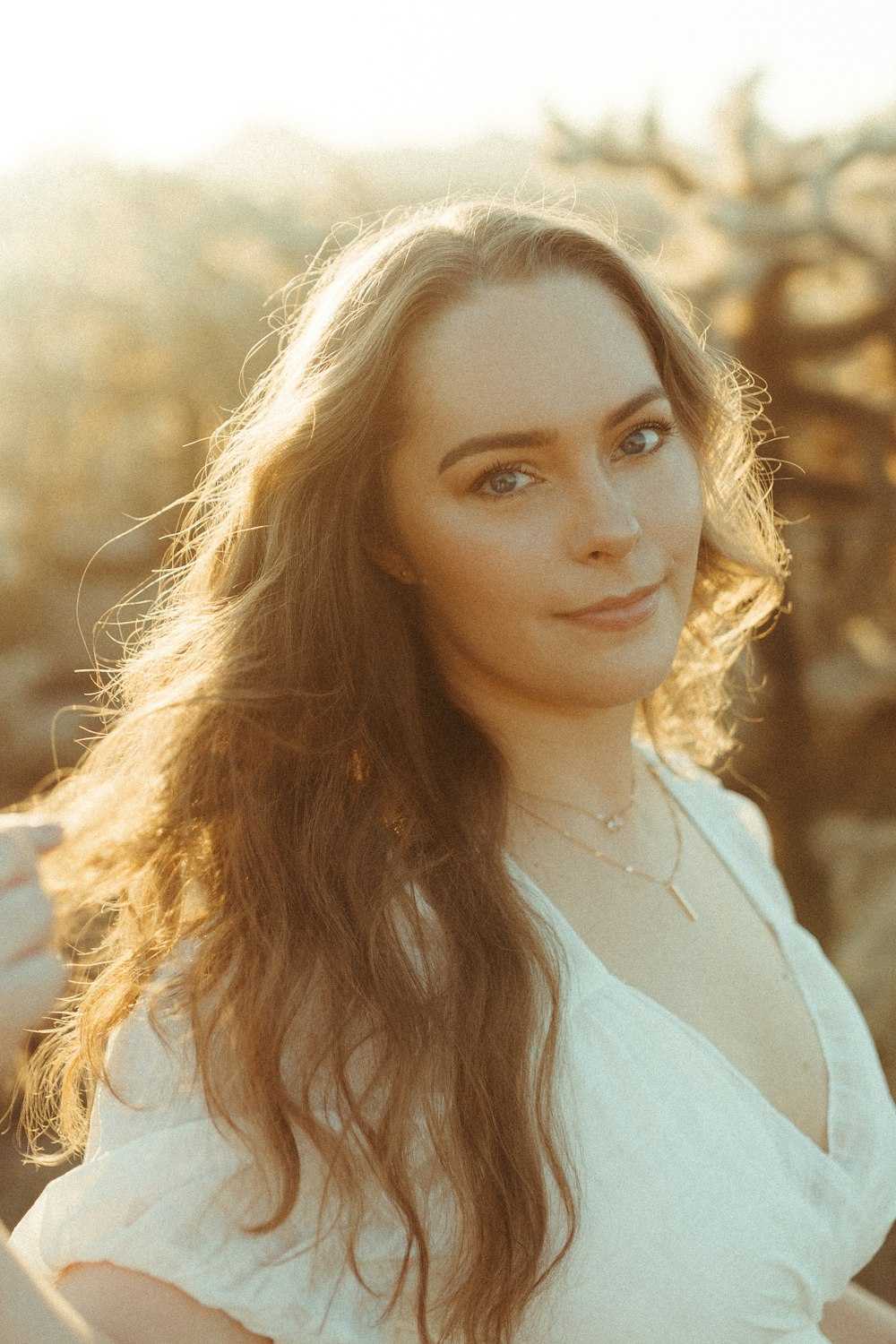 woman in white long sleeve shirt