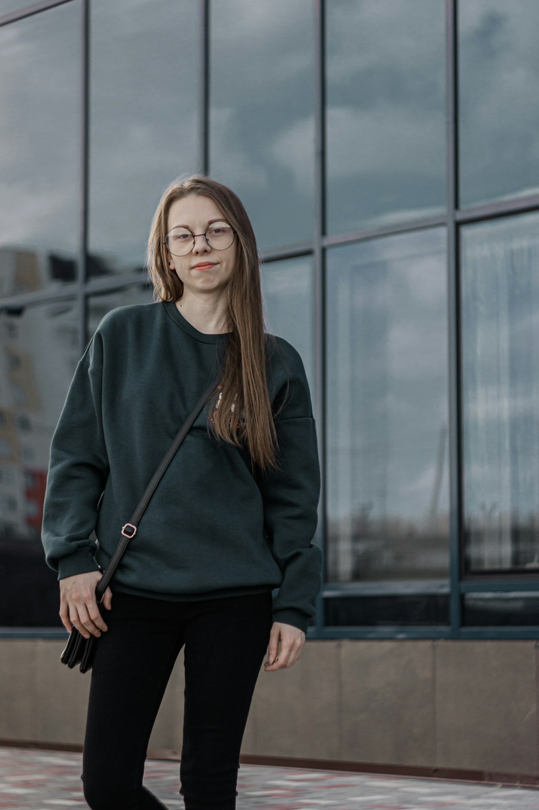 woman in black long sleeve shirt and black pants