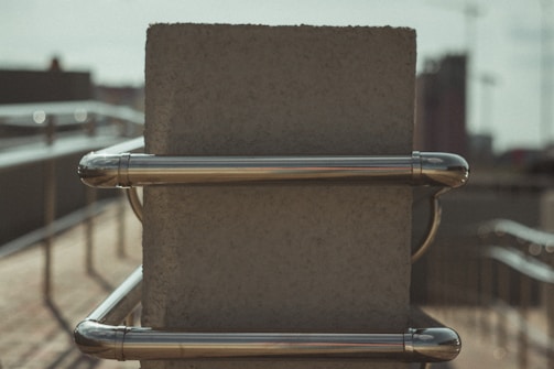 Detail of aluminum railing and window frames blending functionality and design.