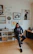 A confident man receiving personal image coaching in a modern, stylish room.