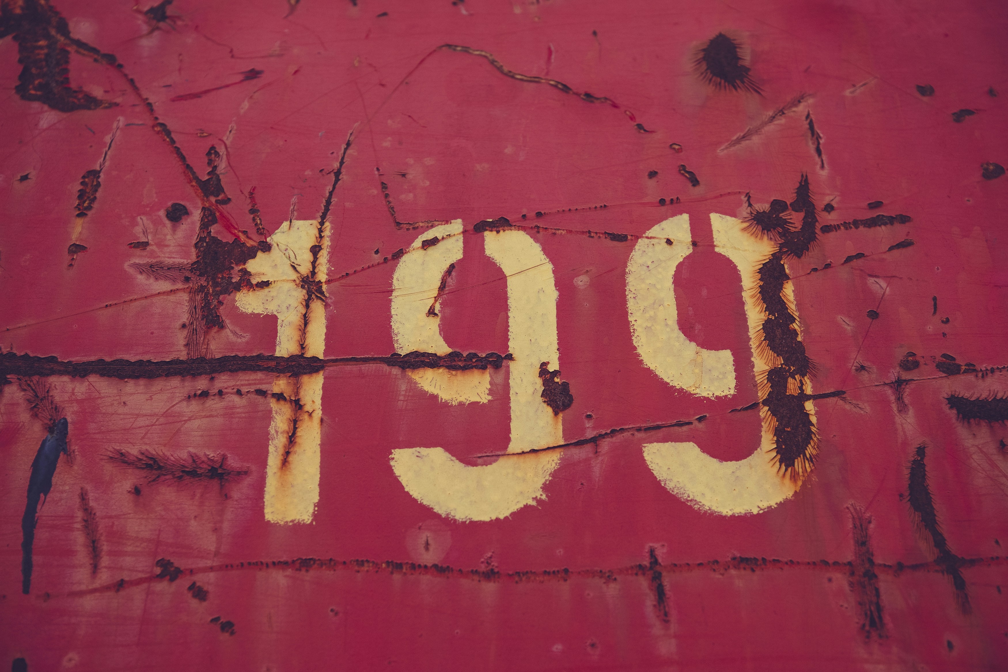 Rusty metal with number 199