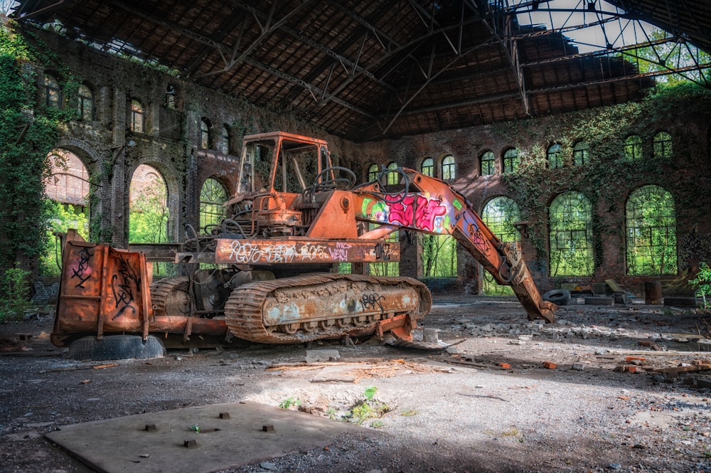 orange heavy equipment inside building