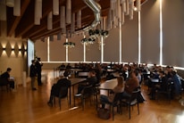 Guests enjoying a conference inside a beautifully restored monumental building.