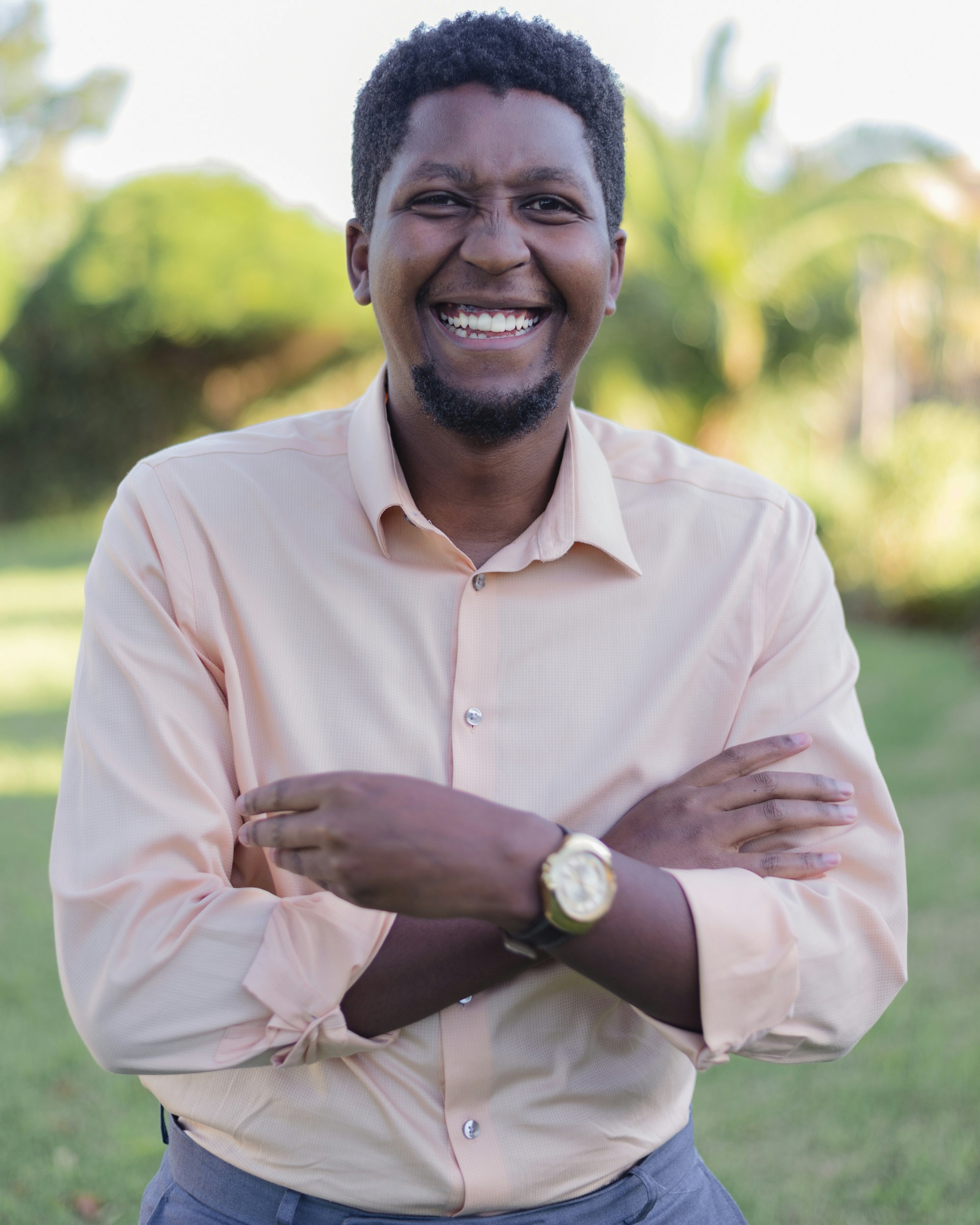 man in white dress shirt smiling