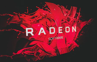 The atamai ssd logo embossed in gold on a deep red background, surrounded by classic gaming elements.