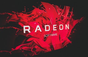 A bold and dynamic design featuring the word 'RADEON' prominently displayed in white text against a vibrant red background with abstract, fluid shapes.
