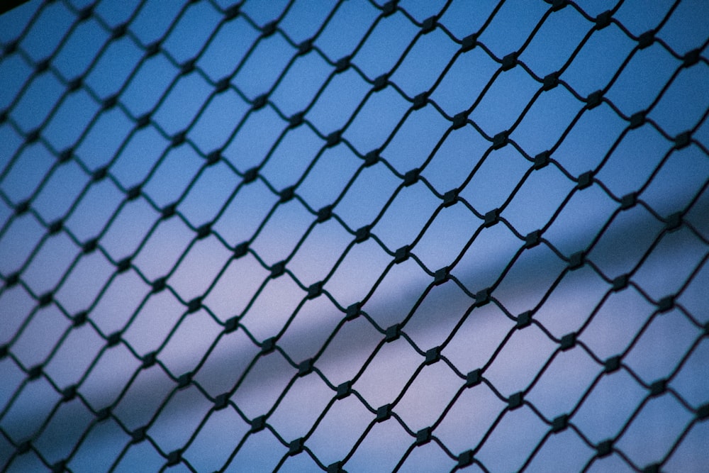 black metal chain link fence