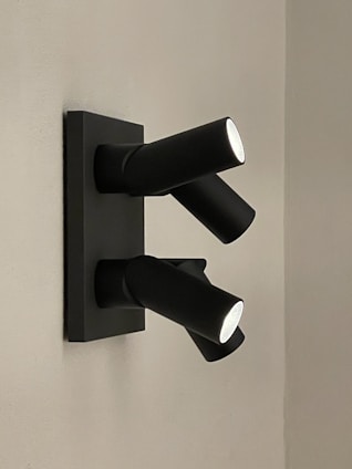 A stylish LED spotlight highlighting a decorative feature.