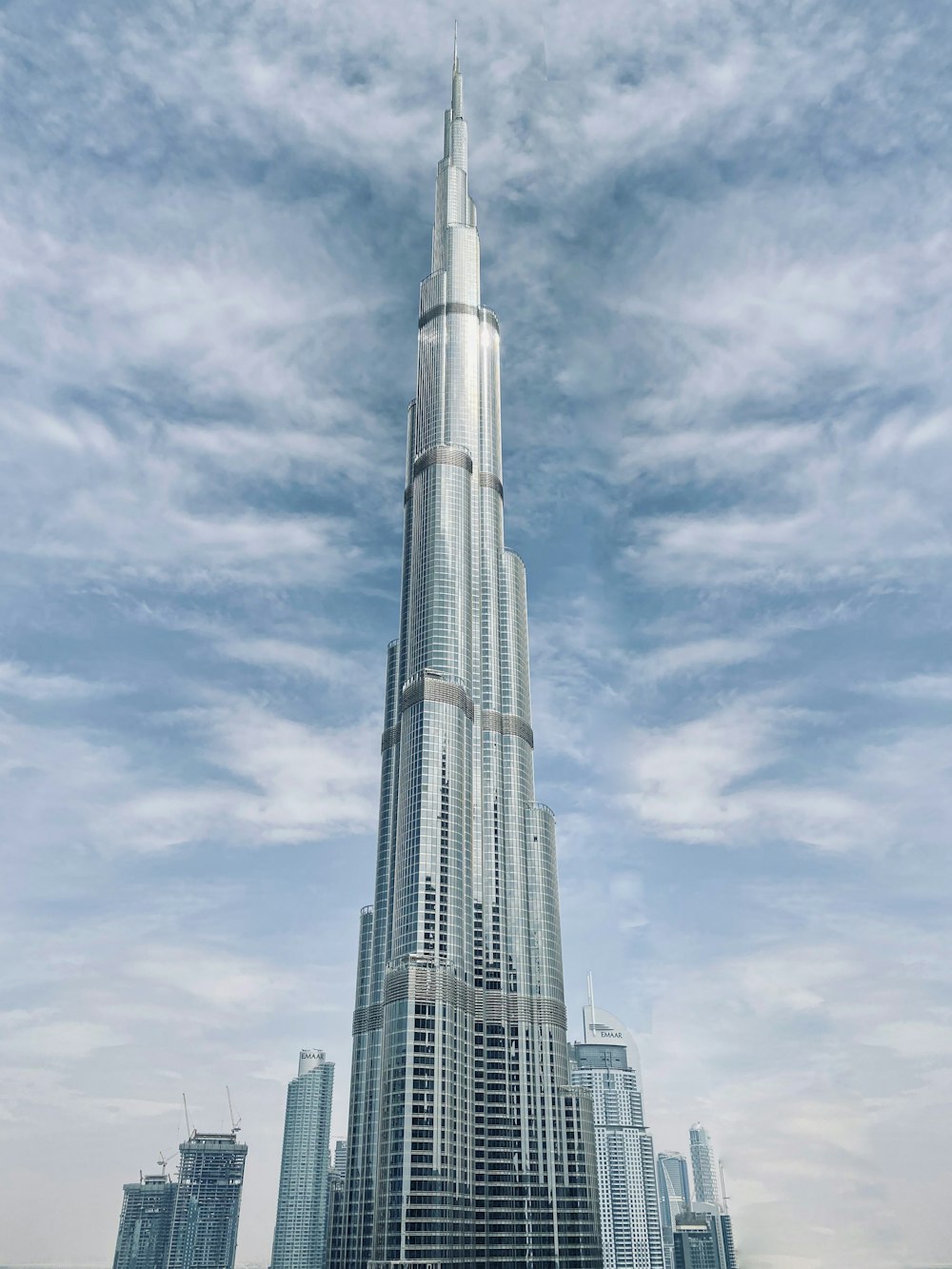 white and gray concrete building under blue sky during daytime