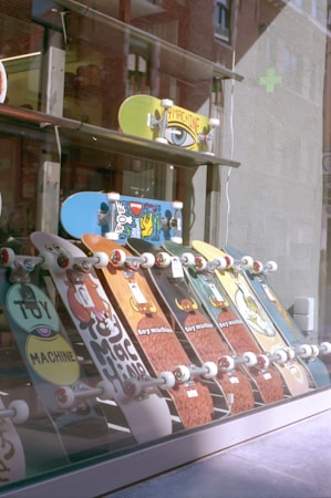 Colorful skateboards on display in a skate shop